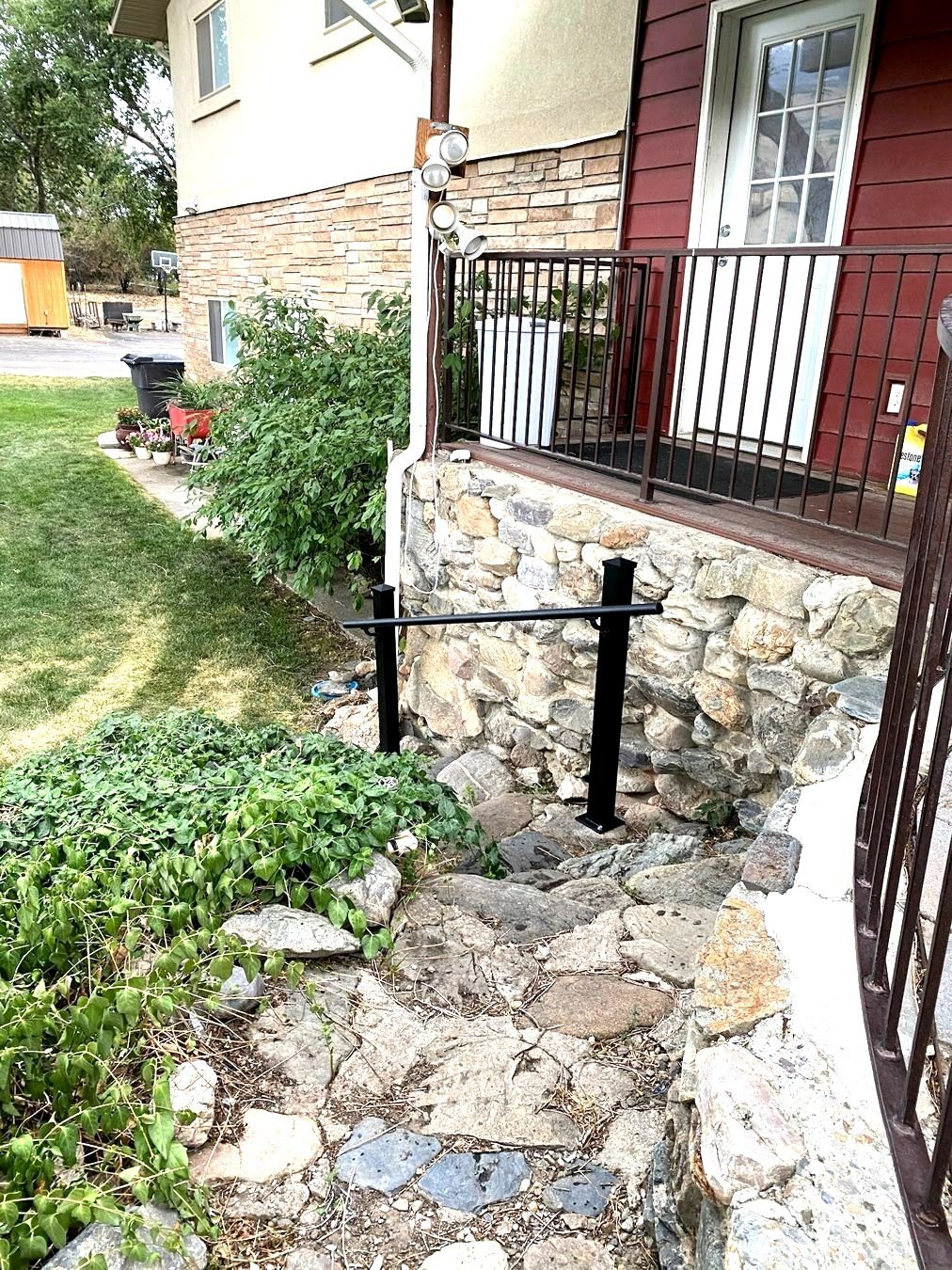 Stone stairs leading to the lower yard